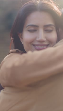 Vertical-Video-Close-Up-Of-Loving-Muslim-Couple-On-Date-Hugging-Outdoors-2